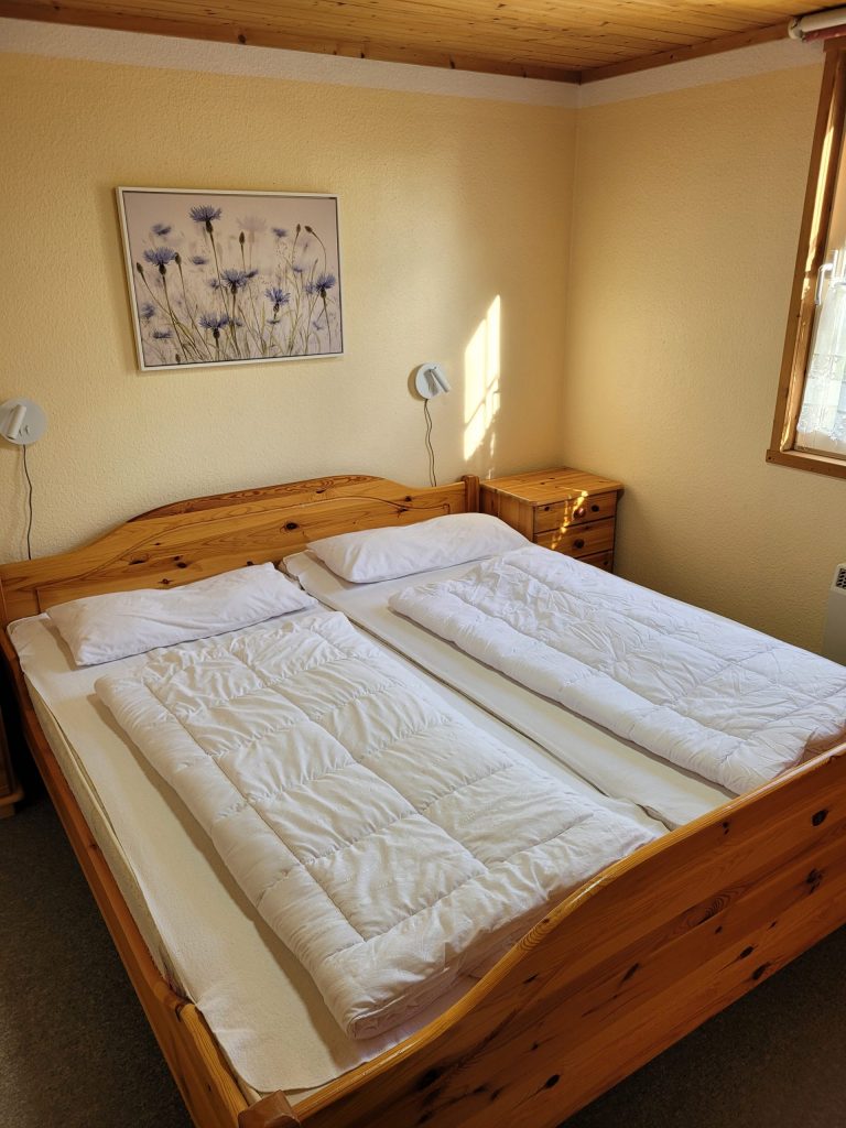 Innenaufnahme vom Ferienhaus Seebrise, Schlafzimmer mit Doppelbett.